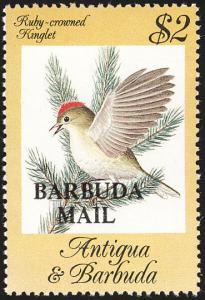 Colnect-1859-765-Ruby-crowned-Kinglet-Regulus-calendula---Overprinted.jpg