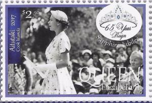 Colnect-4348-213-Queen-Elizabeth-II-holding-paper-c-1953.jpg