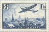 Colnect-143-069-Plane-flying-over-Paris.jpg