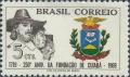 Colnect-3687-209-Men-of-three-races-and-Arms-of-Cuiaba.jpg