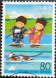 Colnect-2446-305-Children--s-feet-in-the-water-and-ducks.jpg