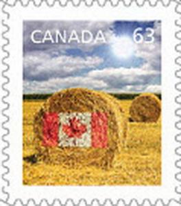 Colnect-2045-863-Flag-on-hay-bale.jpg