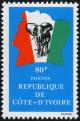 Colnect-2311-914-Elephant-in-front-of-map-of-Ivory-Coast.jpg