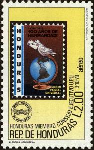 Colnect-4960-924-Brieftaube-sits-on-globe.jpg