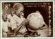 Colnect-184-437-Independence-of-Congo-Boy-pointing-on-globe.jpg