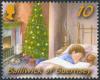 Colnect-3966-275-Sleeping-Boy---Christmas-Tree.jpg