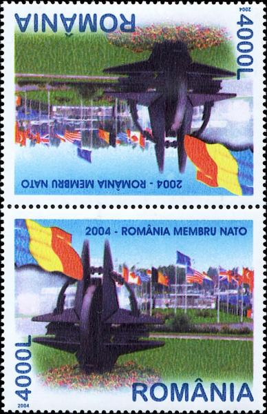 Colnect-5375-870-NATO-Monument-Romanian-Flag-Headquarters-T-ecirc-te-b-ecirc-che-Pair.jpg