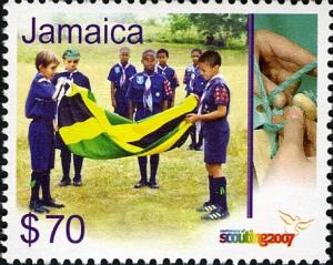 Colnect-749-575-Scouts-handling-Jamaican-flag.jpg