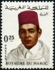 Colnect-899-460-King-Hassan-II-1929-1999.jpg