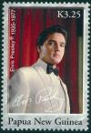 Colnect-3455-386-Elvis-in-white-tuxedo-with-black-tie.jpg