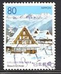 Colnect-820-234-Houses-in-Snow.jpg