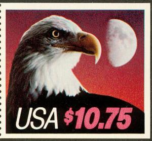 Colnect-2667-418-Bald-Eagle-Haliaeetus-leucocephalus-and-Moon.jpg