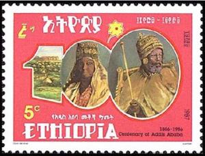 Colnect-3317-193-Emperor-Menelik-II-Empress-Taitu-and-city.jpg