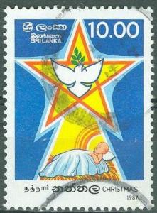 Colnect-2105-154-Christ-Child-in-Manger-Star---Dove.jpg