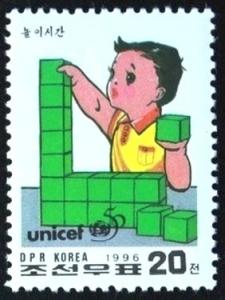 Colnect-2942-925-Boy-playing-with-building-blocks.jpg