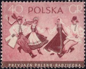 Colnect-4285-740-Two-couples-dancing-in-Polish-and-Russian-folk-costumes.jpg