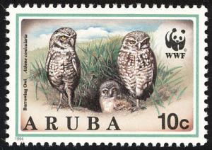 Colnect-579-867-WWF-Burrowing-owl-Two-adults-young.jpg