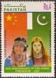 Colnect-2145-358-Girls-in-traditional-Yugur-and-Hunza-costumes.jpg