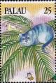 Colnect-5494-909-Cheshire-cat-in-palm-tree.jpg