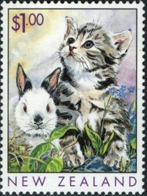 Colnect-2127-399-Kitten-Felis-silvestris-catus-and-Rabbit-Oryctolagus-cuni.jpg