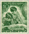 Colnect-154-799-Boys-with-stamp-album-globe.jpg