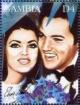 Colnect-4686-028-Elvis-with-his-wife-Priscilla.jpg