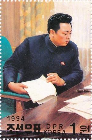 Colnect-3176-071-Kim-Jong-Il-at-the-desk.jpg