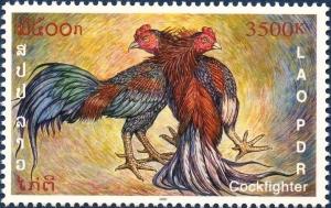 Colnect-2428-496-Fighting-Cocks-Gallus-gallus-domesticus.jpg