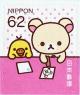 Colnect-5255-104-Korilakkuma-Writing-Postcards.jpg