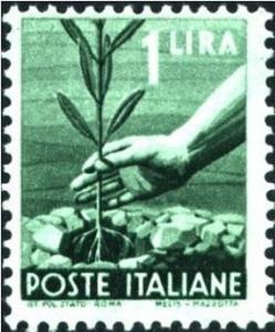 Colnect-1112-627-Hand-planting-an-olive-tree.jpg