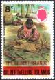 Colnect-3266-016-Overprint-Woman-weaving-Pandanus-fronds.jpg