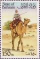 Colnect-862-445-Dromedary-Camelus-dromedarius-and-Rider.jpg