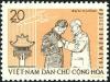 Colnect-5494-485-Pres-Ho-Chi-Minh-pinning-medal-on-Titov.jpg