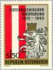 Colnect-136-586-Eagle-head-with-mural-crown--amp--Austrian-flag.jpg