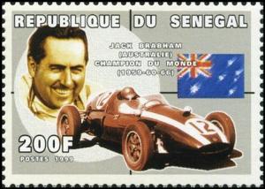 Colnect-2229-867-Jack-Brabham-1926-2014-and-Cooper-T51.jpg