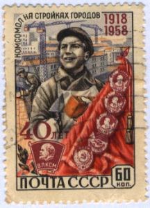 Komsomol_on_construction_of_cities_USSR_stamp.png