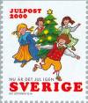 Colnect-164-985-Children-dancing-round-christmas-tree.jpg