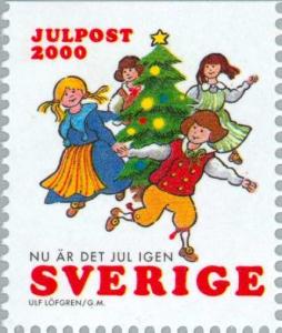 Colnect-164-985-Children-dancing-round-christmas-tree.jpg