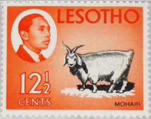 Colnect-3453-417-King-Moshoeshoe-II-and-Angora-Goat-Capra-aegagrus-hircus.jpg