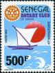 Colnect-2089-678-Sailship-Sun-and-Rotary-International-Emblem.jpg