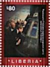 Colnect-7374-244-John-F-Kennedy-Views-a-Space-Capsule.jpg