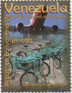 Colnect-3063-884-Airplane-and-Postal-Bicycles.jpg