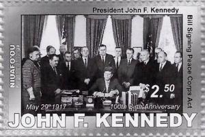 Colnect-4340-921-Pres-J-F-Kennedy-signing-Peace-Corps-Act.jpg