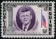 Colnect-956-240-President-Kennedy-1917-1963-American-flag.jpg