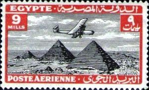 Colnect-1282-020-Aircraft-flying-over-the-Pyramids-of-Giza.jpg