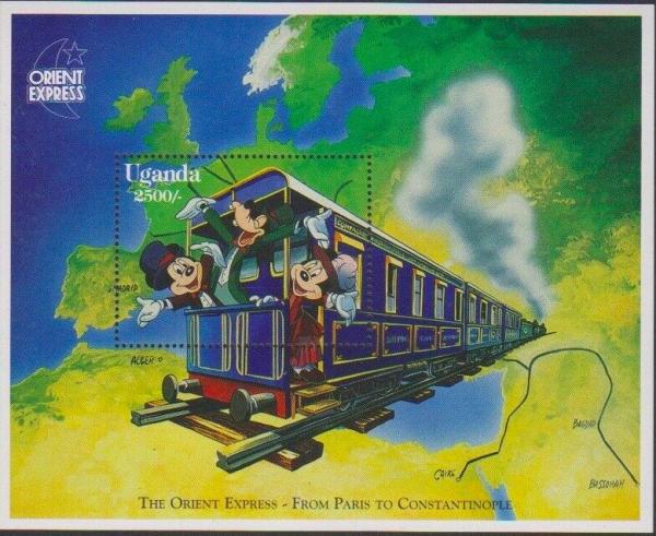 Colnect-6024-615-Mickey-Goofy-Minnie-waving-from-back-of-train.jpg