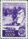 Colnect-192-985-Hunting-Hunters-with-killed-wolves.jpg