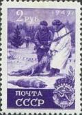 Colnect-192-985-Hunting-Hunters-with-killed-wolves.jpg