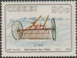 Colnect-3502-626-Farm-implements-Self-dump-hay-rake-1910.jpg