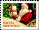 Colnect-199-866-Santa-with-Present.jpg